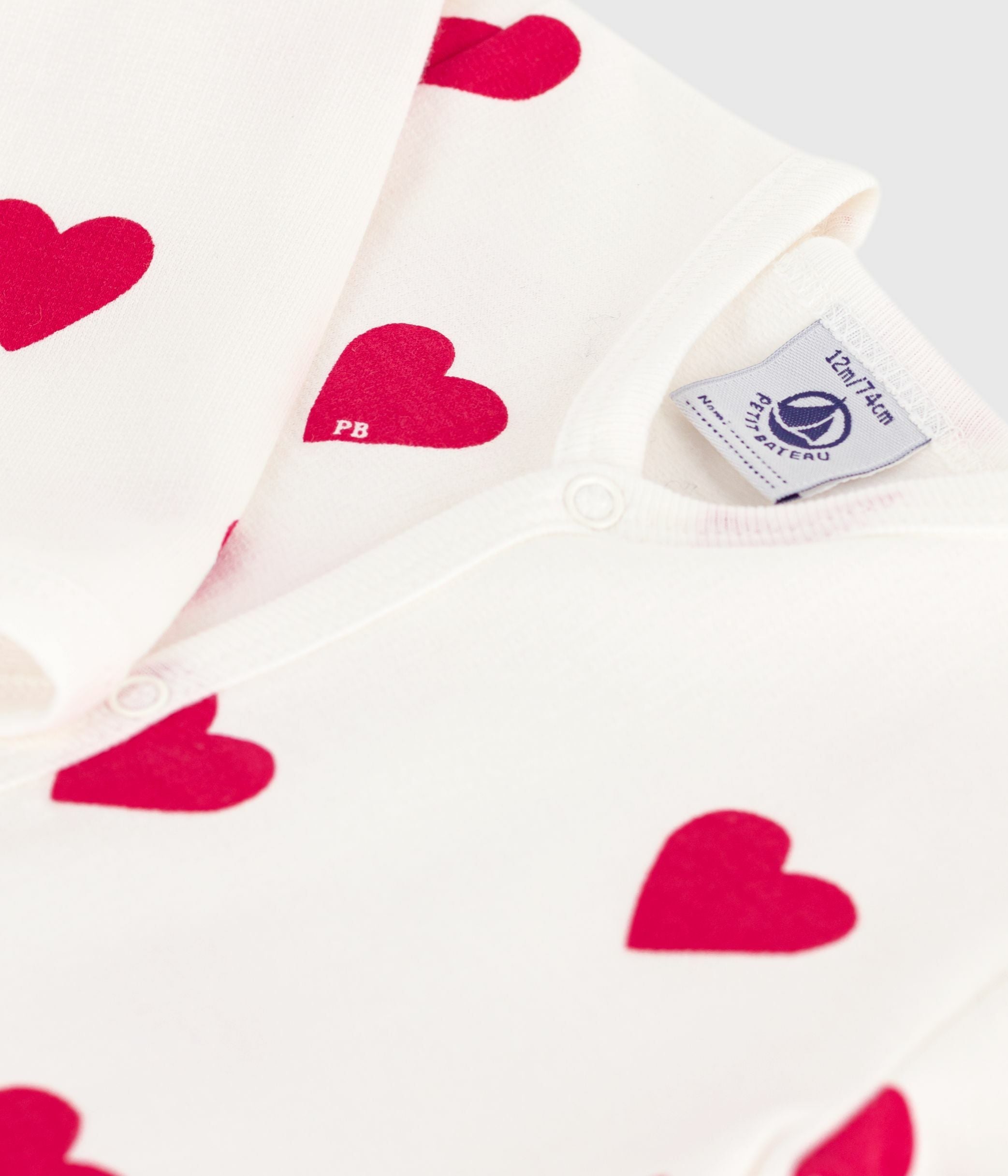 pyjama-bébé-en-molleton-gratté-à-col-imprimé-cœurs
