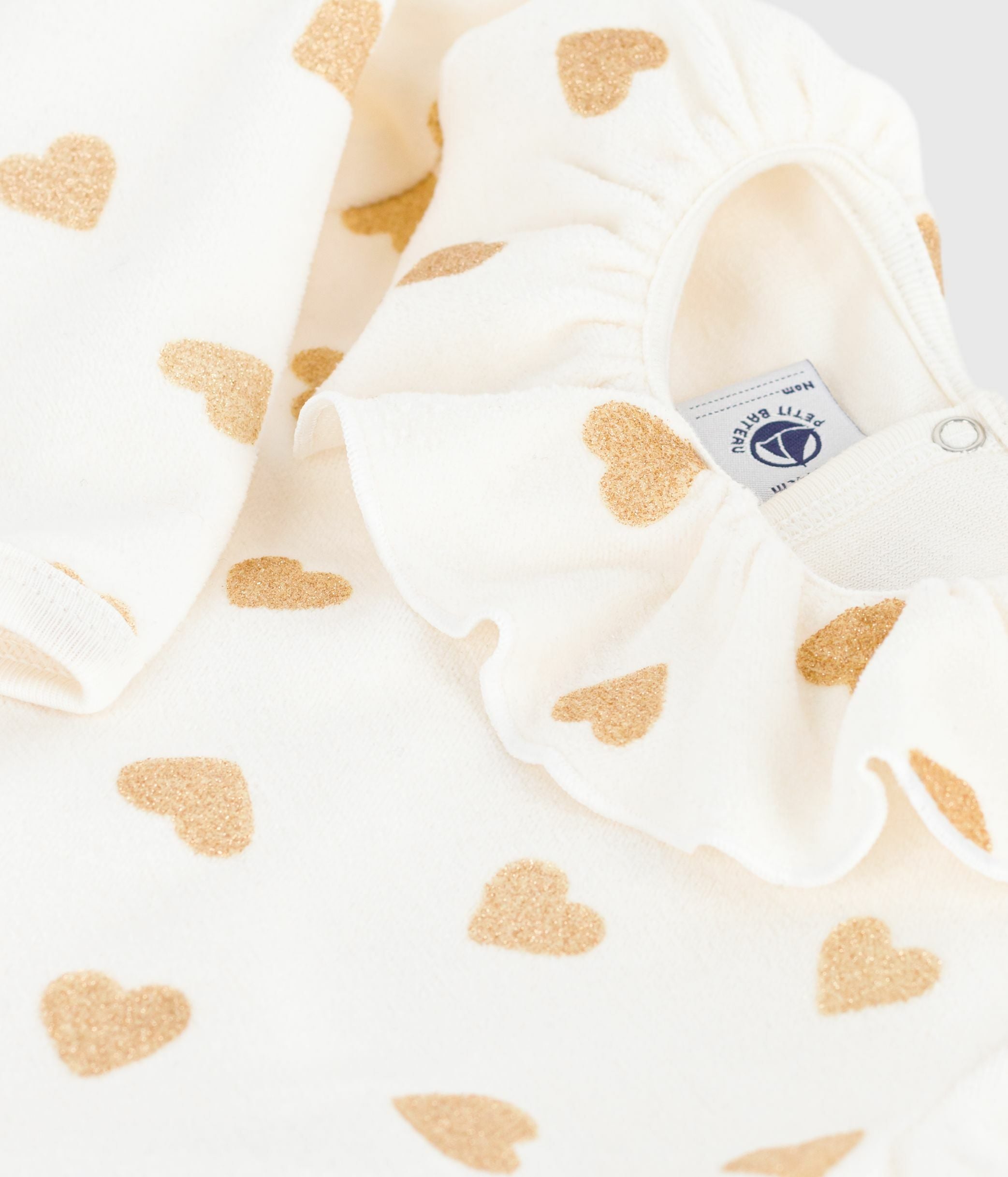 pyjama-bébé-en-velours-ouverture-au-dos-imprimé-cœurs-dorés