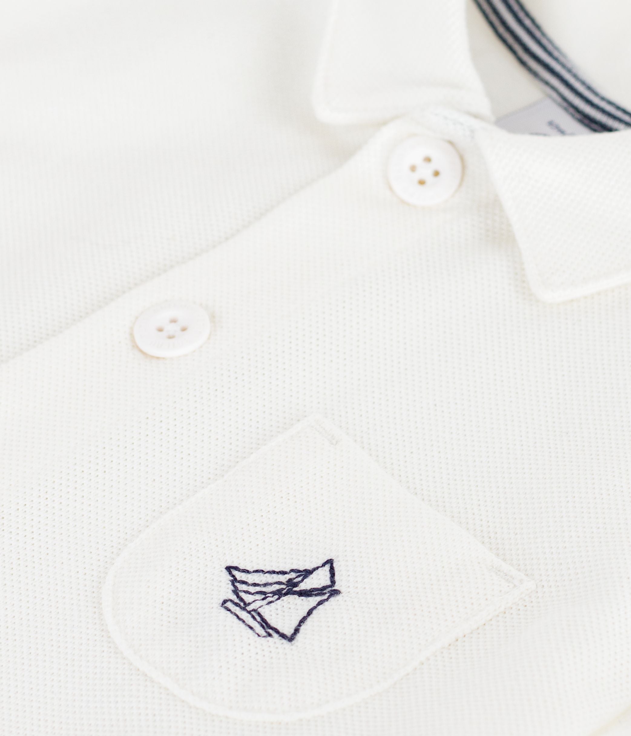 combinaison-courte-col-polo-bébé-en-coton-unie