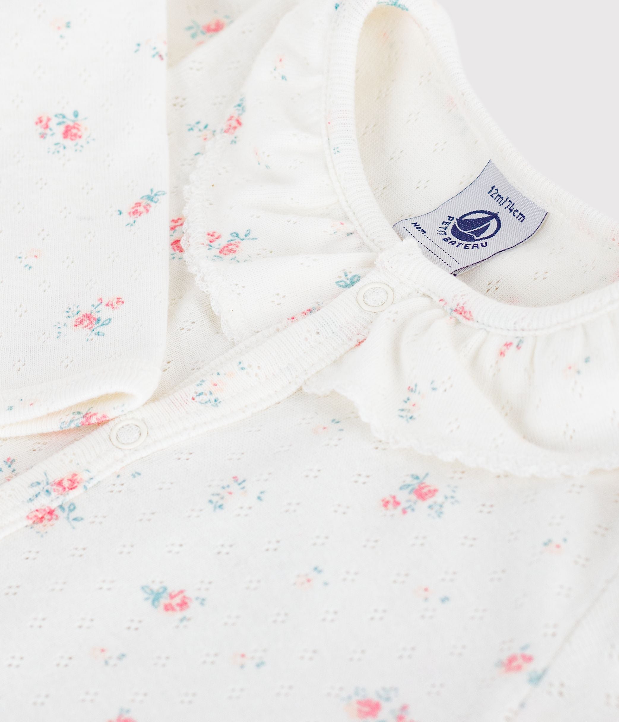 pyjama-bébé-en-coton-ajouré-sans-pieds-avec-col-imprimé-fleuri