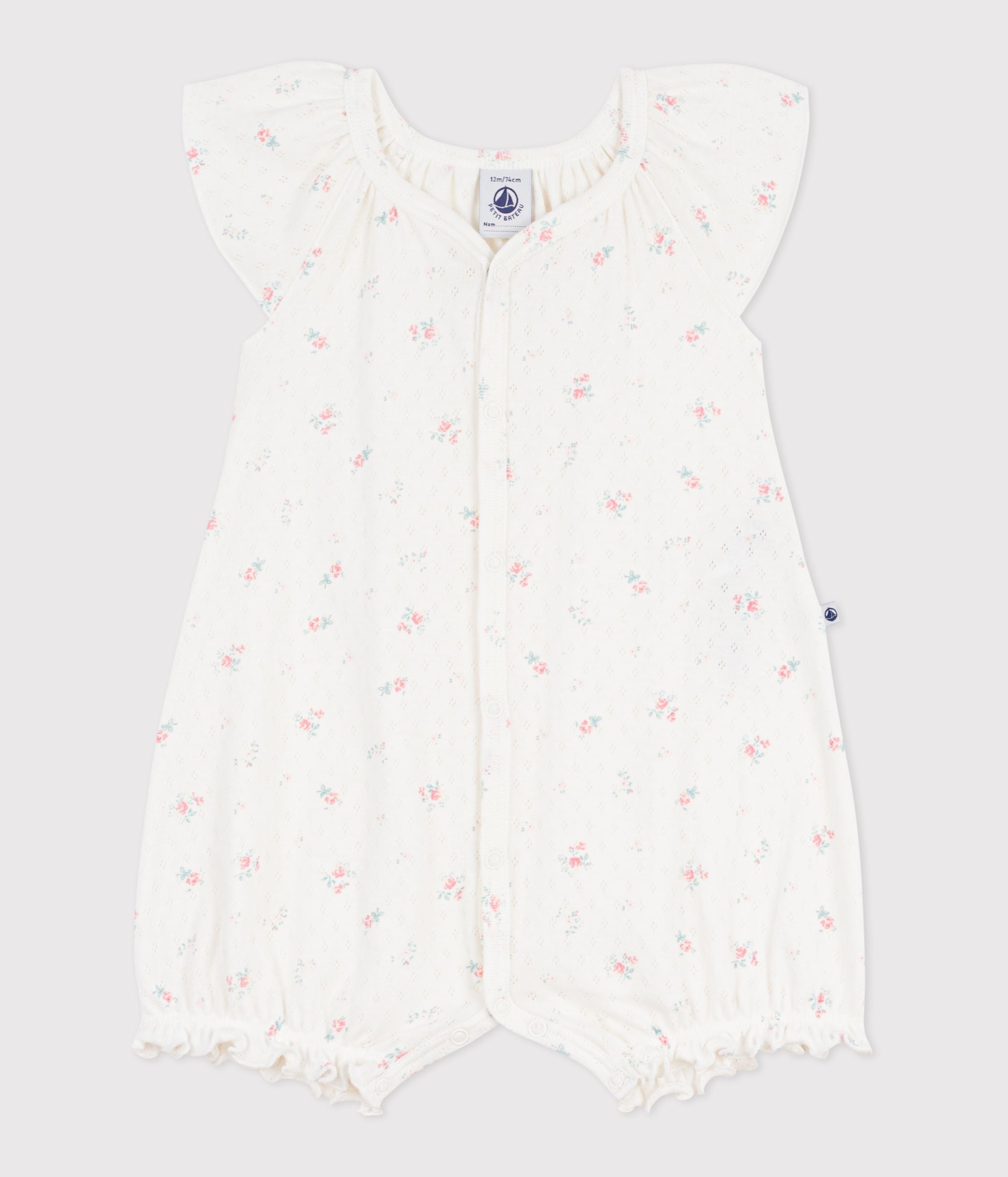 combinaison-courte-bébé-en-coton-fleuri