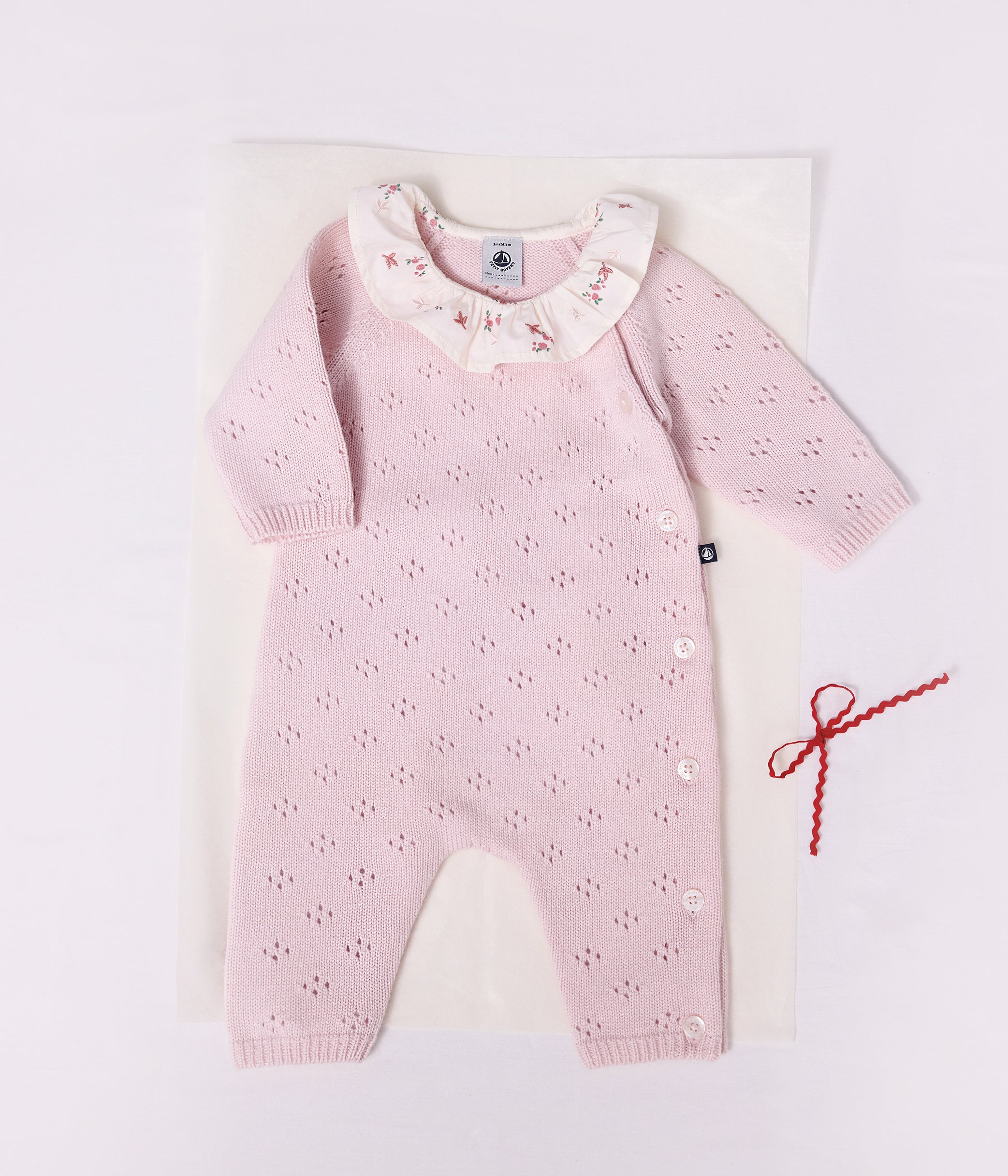 combinaison-bébé-en-tricot-laine-et-coton-à-col-uni