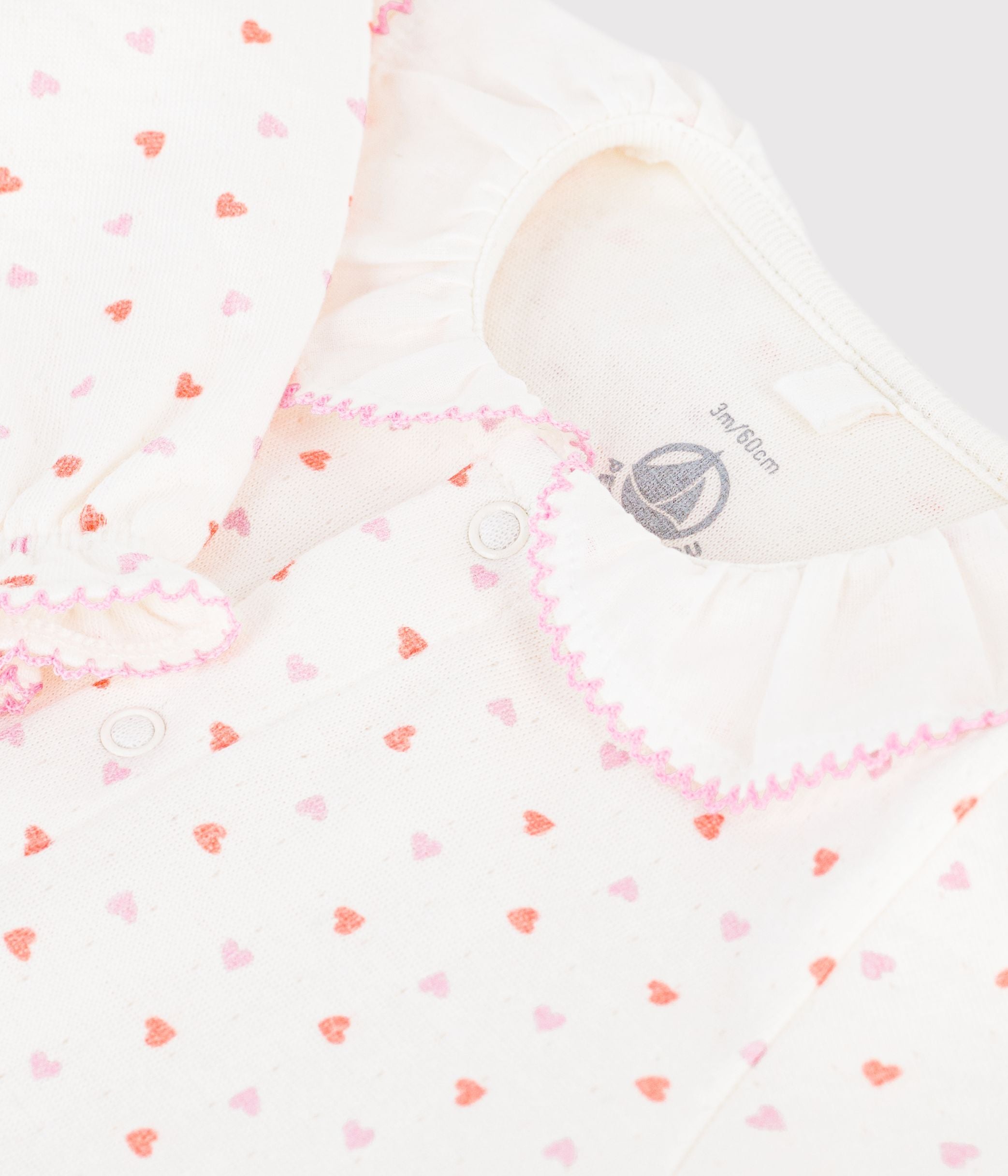 pyjama-bébé-en-tubique-imprimé-à-coeurs