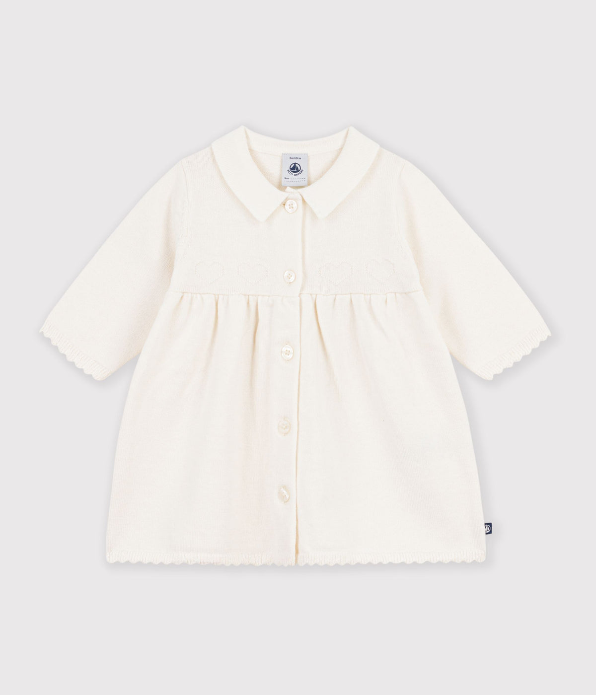 robe-bébé-à-col-en-tricot-uni