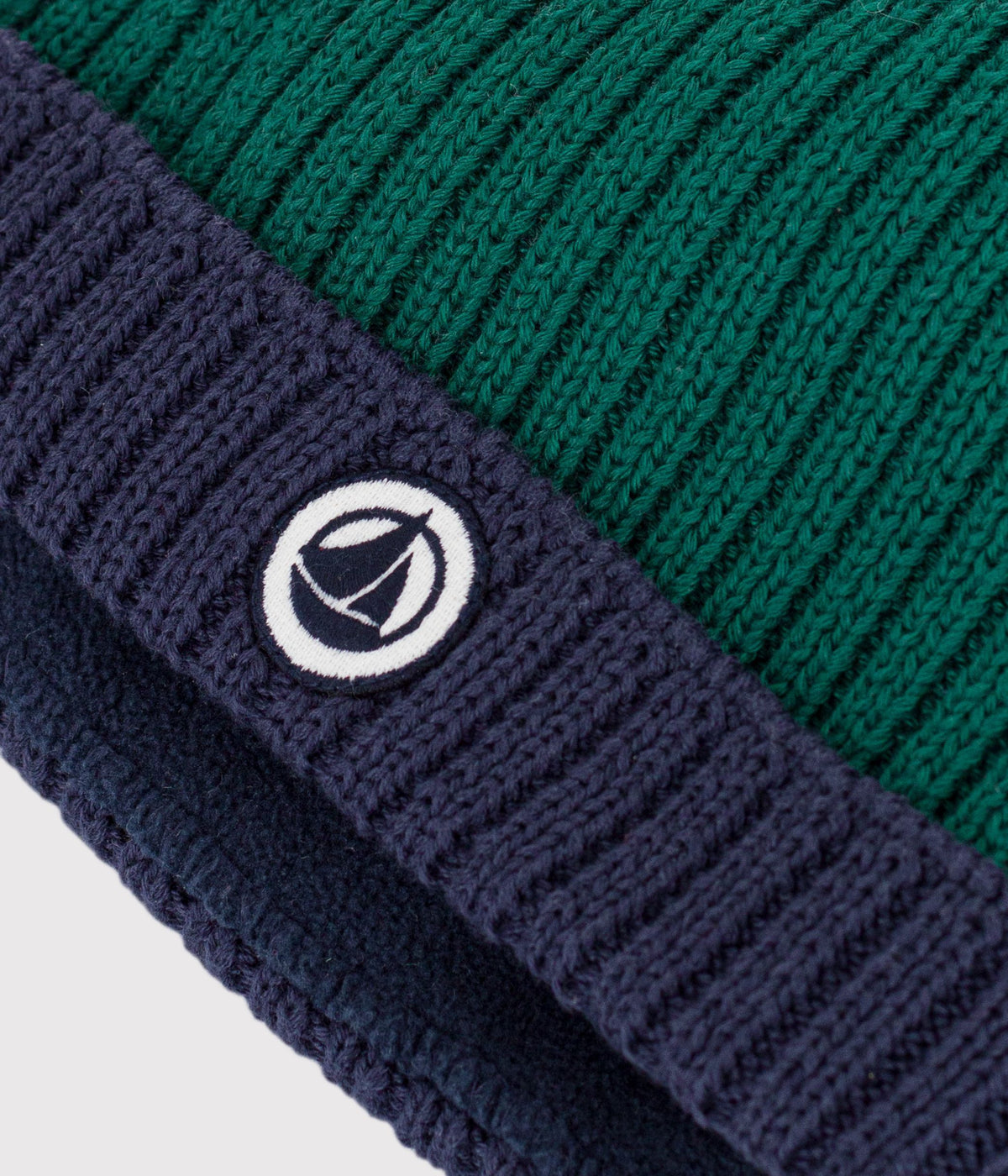 bonnet-bébé-en-tricot-bicolore-doublé-polaire