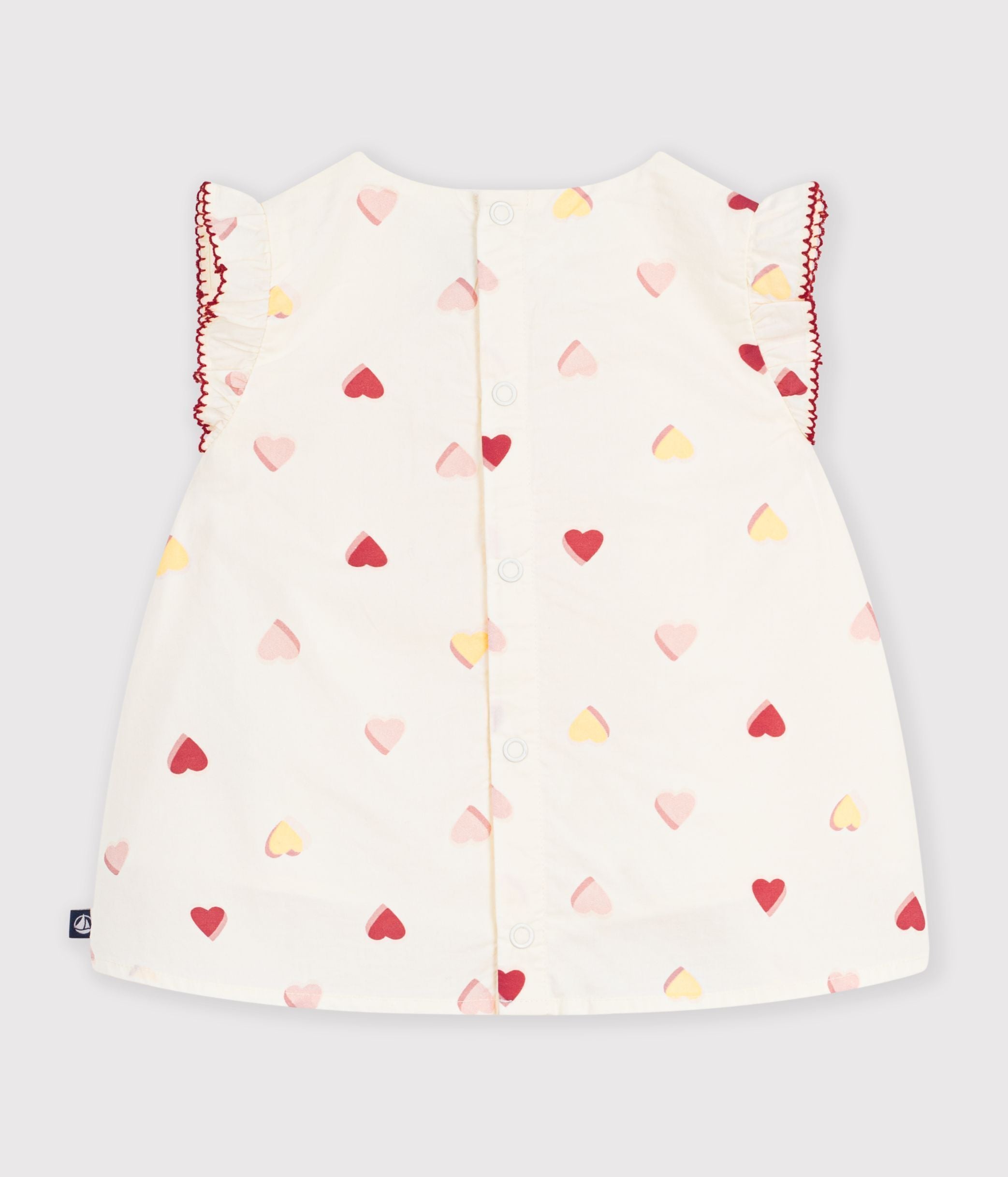 blouse-bébé-en-popeline-de-coton-sans-manches-imprimée-coeurs