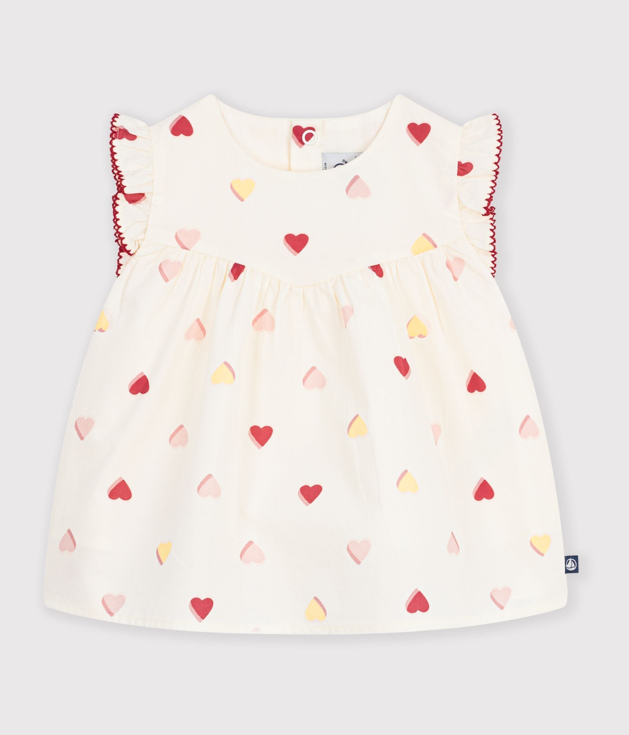 blouse-bébé-en-popeline-de-coton-sans-manches-imprimée-coeurs