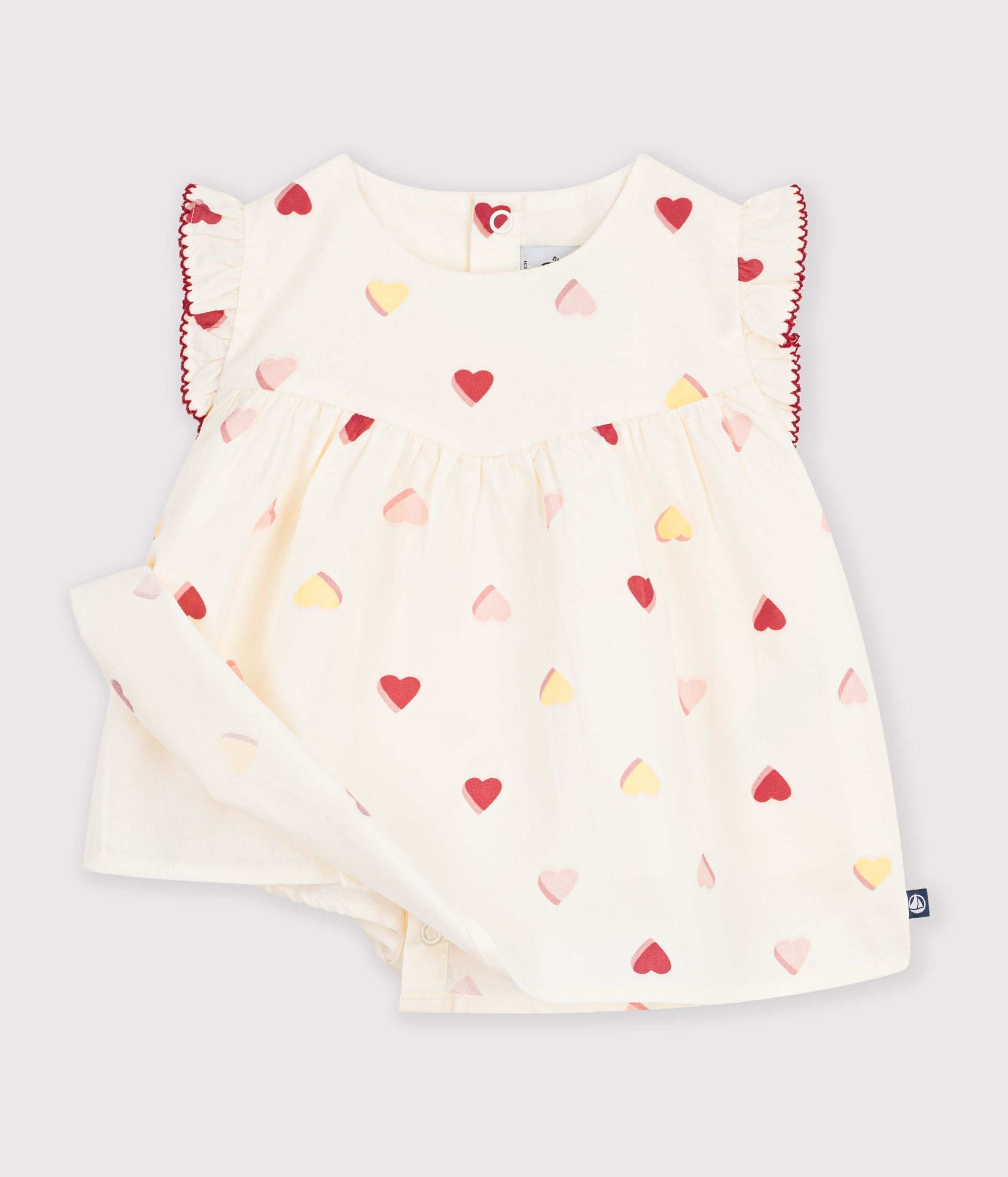 blouse-bébé-en-popeline-de-coton-sans-manches-imprimée-coeurs