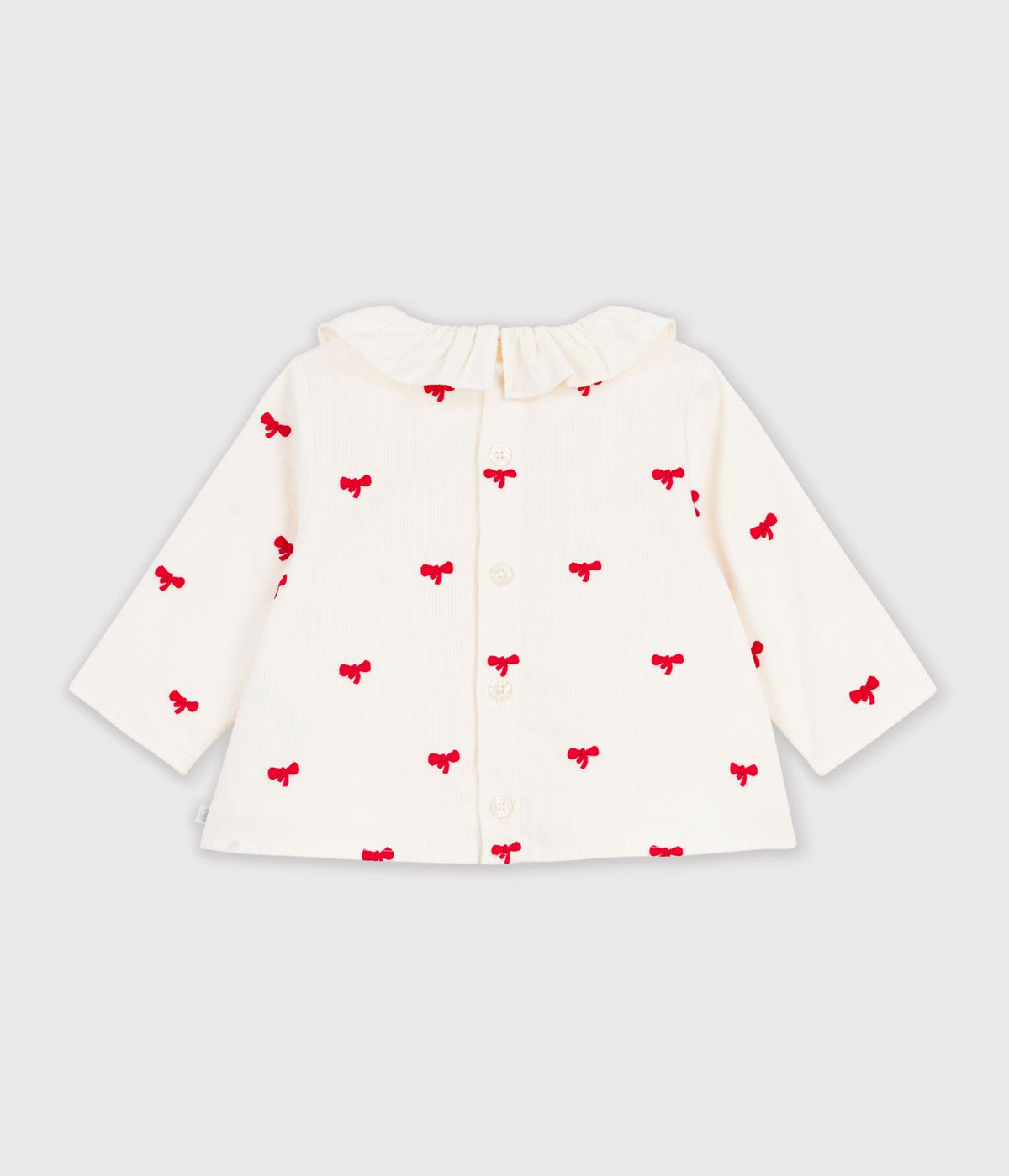 blouse-bébé-en-velours-brodé-motif-noeuds
